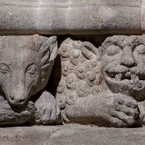 Detail of bears and beasts in the foundations of the Portico of Glory